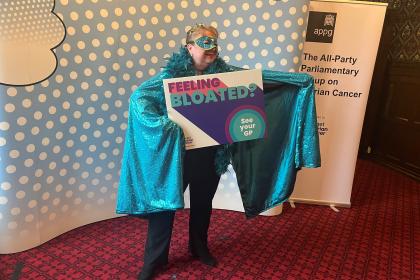 A photo of Sharon Hodgson MP dressed as a superhero at our Teal Heroes event in Westminser