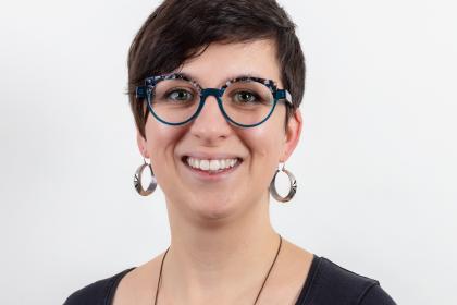 A headshot of Dr Emma Dennett, Target Ovarian Cancer's Research Manager