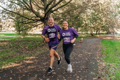 Man and Woman running at the Target Ovarian Cancer London Walk|Run event 2023