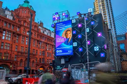 Natalie Wild featuring in an ovarian cancer symptoms billboard in Old Street