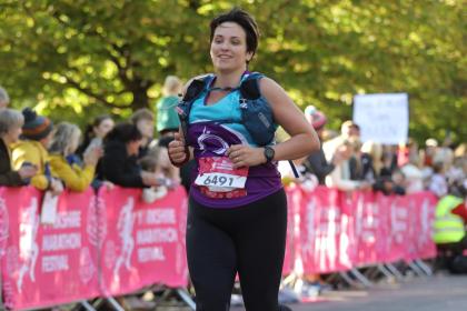 A female supporter running at Yorkshire marathon, 2023
