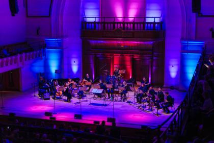 A photo of musicians on stage at Playing Our Part