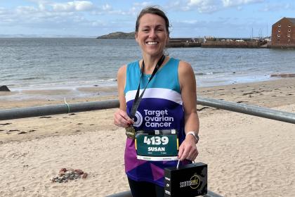 Female supporter smiling at Scottish Half Marathon 2024