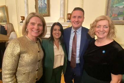 A photo of Catherine Hart, CEO of Target Ovarian Cancer, with two campaigners and West Streeting