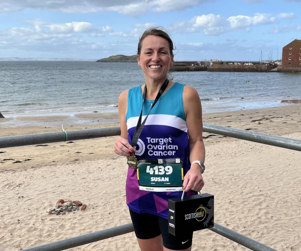 Female supporter smiling at Scottish Half Marathon 2024