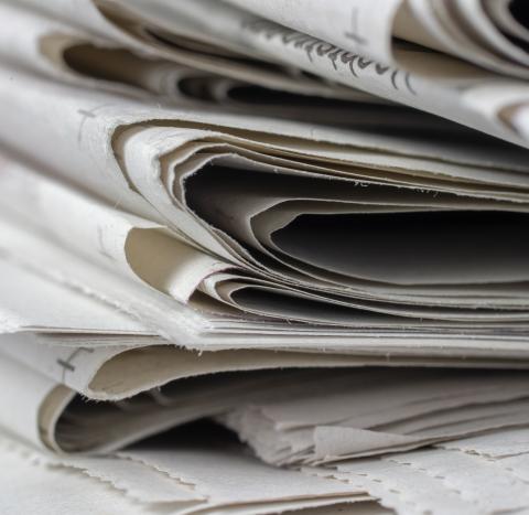 stack of newspapers