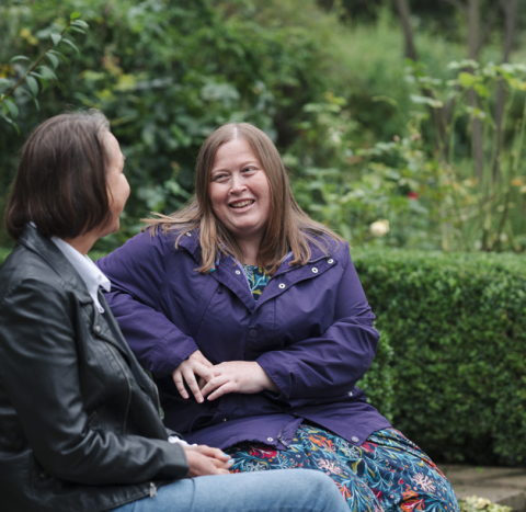 Women on a bench talking