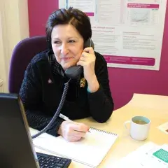 Target Ovarian Cancer Nurse Adviser, Val Lang, taking a call on our support line