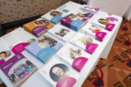 A table with information guides laid out on it