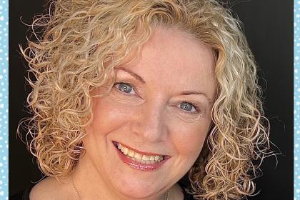 A headshot image of Catherine
