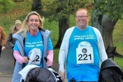 Sarah and her auntie taking part in the Belfast Walk Run wearing Target Ovarian Cancer tshirts and pushing a toddler in a pram