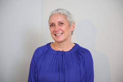 A photo of Treena wearing a blue top smiling