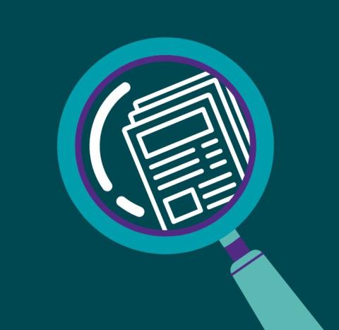 A graphic of a magnifying glass looking at a paper