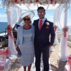 A photo of Adam and Jackie at a wedding abroad 