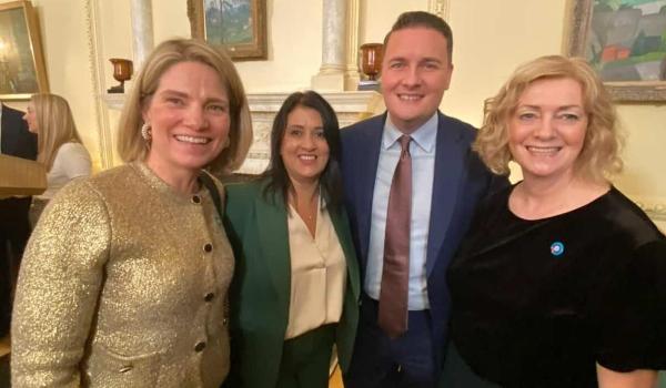 A photo of Catherine Hart, CEO of Target Ovarian Cancer, with two campaigners and West Streeting