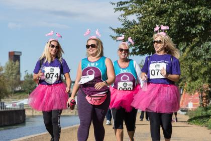 Four fundraisers walking in costume at the Ovarian Cancer Walk|Run