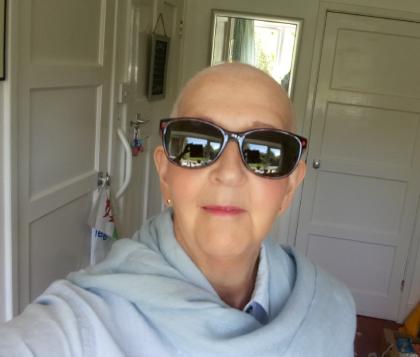 Hilary during chemotherapy treatment taking a sefie with sunglasses on