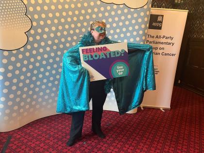 A photo of Sharon Hodgson MP dressed as a superhero at our Teal Heroes event in Westminser