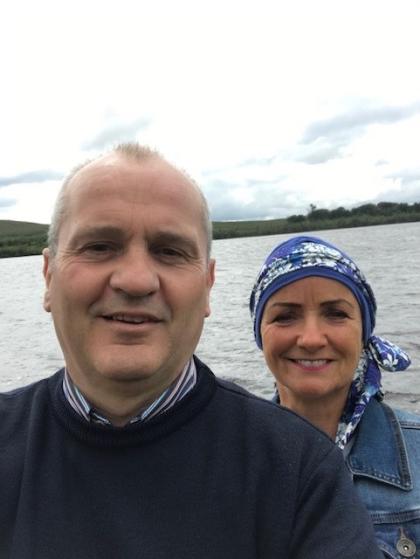 A selfie of Pauline and Declan out walking, Pauline is wearing a headscarf
