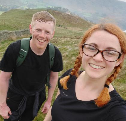 Lucy and her partner John taking a selfie whilst out walking